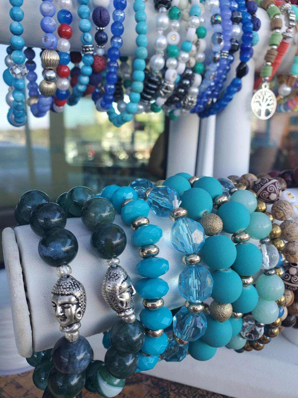Beaded Bracelets on display in different hues of blue.